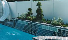 Tiled Raised Beams Create a Waterfall and Planter